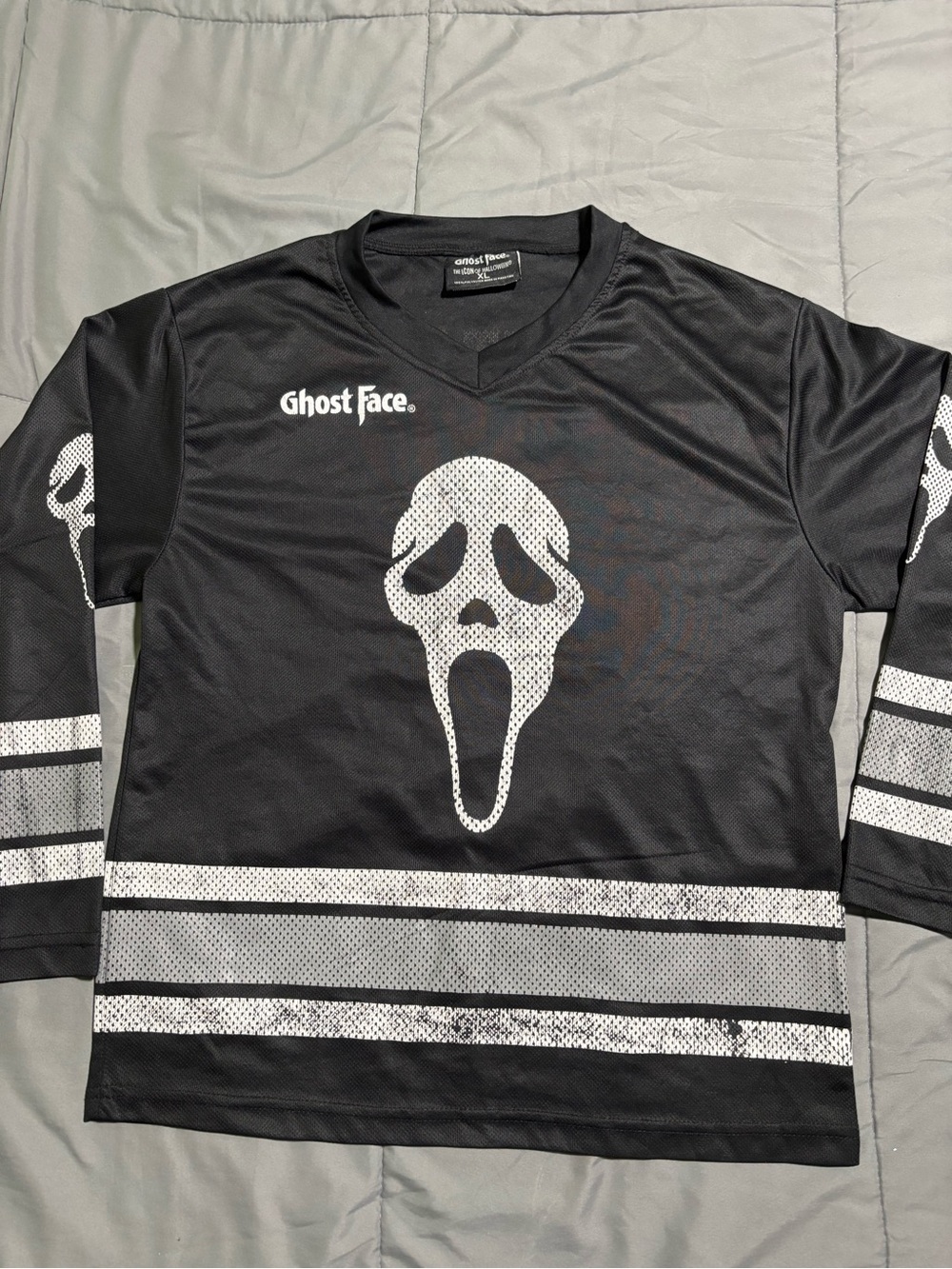 Ghost Face Black Hockey Jersey with White Scream Graphic. XL